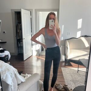 Grey body suit